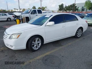 2007 Toyota Avalon XL with VIN 4T1BK36B97U245780, listed as a IAAI auction lot 41896152 with 114,972 mi miles. Bid and sale history available at carsss.com. Image 2.