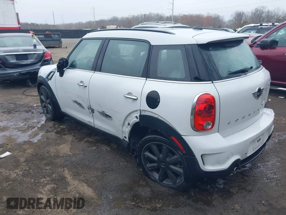 2014 MINI Countryman S with VIN WMWZC3C55EWP52138, listed as a IAAI auction lot 40695292 with 83,083 mi miles and . Bid and sale history available at DreamBid. Image 3.
