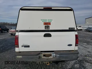 2004 Ford Super Duty F-250 XL with VIN 1FTNX21P04ED89661, listed as a Copart auction lot 45214445 with 314,538 mi miles and Salvage Title. Bid and sale history available at carsss.com. Image 6.