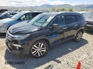 2017 Honda Pilot Touring z VIN 5FNYF6H97HB090784, wystawiony jako Copart lot #55999105 z przebiegiem 116 902 mil mil oraz Szkoda całkowita • Salvage title. Historia ofert i sprzedaży dostępna na DreamBid. Obrazek 1.