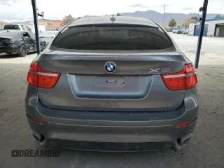 2012 BMW X6 50i z VIN 5UXFG8C53CL590742, wystawiony jako Copart lot #52072205 z przebiegiem 98 177 mil mil oraz Tytuł czysty. Historia ofert i sprzedaży dostępna na DreamBid. Obrazek 6.