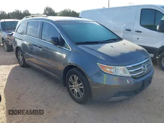 2012 Honda Odyssey EX-L with VIN 5FNRL5H63CB006272, listed as a IAAI auction lot 42074163 with 187,785 mi miles and . Bid and sale history available at carsss.com. Image 1.