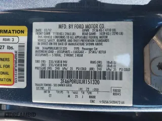 2018 Ford Fusion Hybrid Titanium with VIN 3FA6P0RUXJR151320, listed as a IAAI auction lot 41706229 with 275,101 mi miles. Bid and sale history available at carsss.com. Image 9.