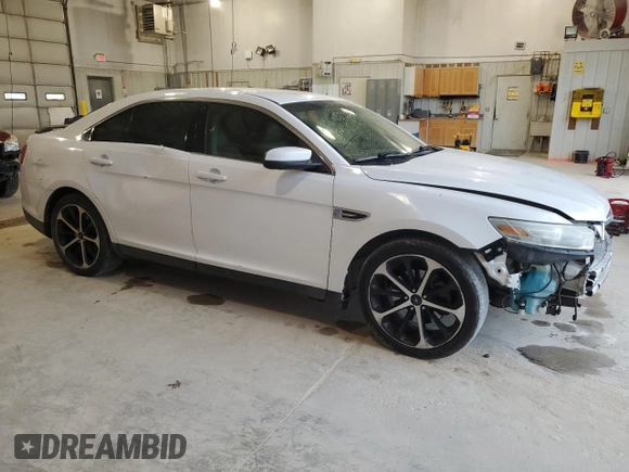 2014 Ford Taurus SEL z VIN 1FAHP2E89EG121025, wystawiony jako Copart lot #55405535 z przebiegiem 168 004 mil mil oraz Czysty tytuł • Clean title. Historia ofert i sprzedaży dostępna na DreamBid. Obrazek 4.