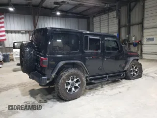 2021 Jeep Wrangler Unlimited Rubicon z VIN 1C4HJXFG7MW651772, wystawiony jako Copart lot #51651685 z przebiegiem 59 351 mil mil oraz Szkoda całkowita • Salvage title. Historia ofert i sprzedaży dostępna na DreamBid. Obrazek 3.