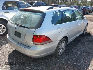 2013 Volkswagen Jetta SportWagen S with VIN 3VWPP7AJ2DM693289, listed as a IAAI auction lot 41859724 with 124,096 mi miles. Bid and sale history available at carsss.com. Image 4.