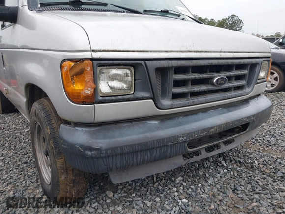 2005 Ford Econoline Cargo with VIN 1FTRE14W85HA67080, listed as a IAAI auction lot 40910996 with 599,247 mi miles. Bid and sale history available at carsss.com. Image 6.