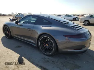 2014 Porsche 911 Carrera S with VIN WP0AB2A92ES121244, listed as a Copart auction lot 79323724 with 36,074 mi miles and Salvage Title. Bid and sale history available at carsss.com. Image 2.