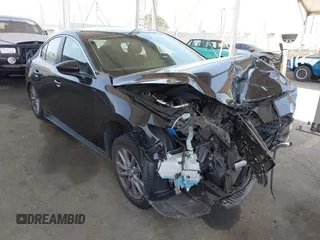 2021 Mazda 3 S with VIN 3MZBPAAL8MM200563, listed as a IAAI auction lot 42586718 with 72,268 mi miles and . Bid and sale history available at DreamBid. Image 1.