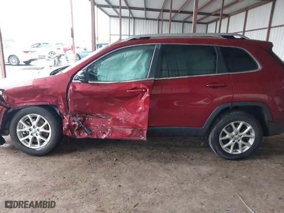 2014 Jeep Cherokee Latitude with VIN 1C4PJLCS5EW252678, listed as a IAAI auction lot 41446486 with 173,125 mi miles. Bid and sale history available at carsss.com. Image 14.