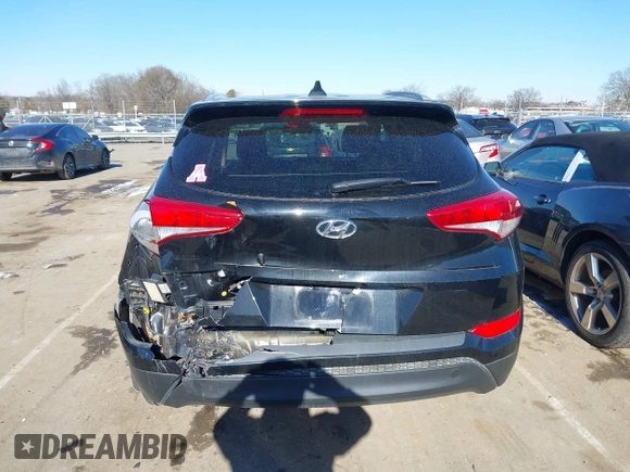 2017 Hyundai Tucson SE Plus with VIN KM8J33A49HU381233, listed as a IAAI auction lot 41393645 with 83,708 mi miles. Bid and sale history available at carsss.com. Image 16.