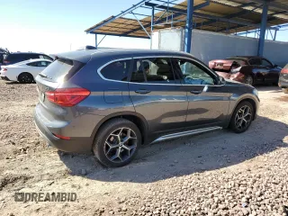 2017 BMW X1 xDrive28i with VIN WBXHT3C32H5F79403, listed as a Copart auction lot 50182775 with 71,003 mi miles and Salvage Title. Bid and sale history available at carsss.com. Image 3.