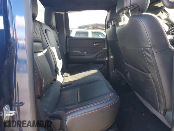 2023 Nissan Frontier Pro-4X z VIN 1N6ED1EK0PN610517, wystawiony jako Copart lot #87213324 z przebiegiem 51 648 mil mil oraz Szkoda całkowita • Salvage title. Historia ofert i sprzedaży dostępna na DreamBid. Obrazek 10.