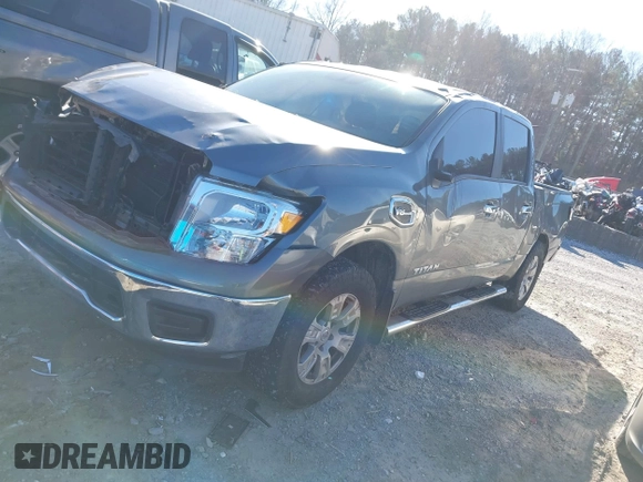 2017 Nissan Titan SV with VIN 1N6AA1EK5HN516884, listed as a IAAI auction lot 41225719 with 109,749 mi miles and . Bid and sale history available at DreamBid. Image 2.
