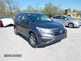 2015 Honda CR-V LX with VIN 2HKRM3H31FH557779, listed as a IAAI auction lot 42098299 with 211,683 mi miles and . Bid and sale history available at carsss.com. Image 1.