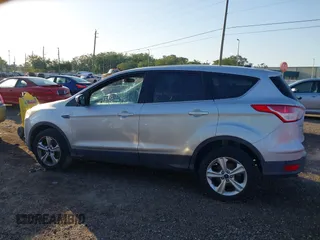 2015 Ford Escape SE with VIN 1FMCU0G95FUA44739, listed as a IAAI auction lot 42030903 with 182,826 mi miles. Bid and sale history available at carsss.com. Image 14.
