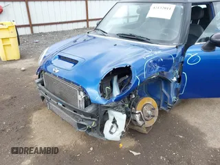 2012 MINI Hardtop S with VIN WMWSV3C53CTY26652, listed as a IAAI auction lot 42132011 with 65,856 mi miles and . Bid and sale history available at DreamBid. Image 6.