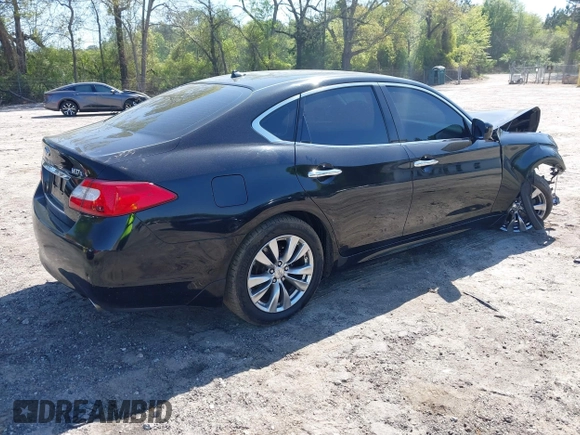 2012 Infiniti M with VIN JN1BY1AR1CM392880, listed as a IAAI auction lot 42012317 with 106,000 mi miles and . Bid and sale history available at DreamBid. Image 4.