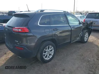 2016 Jeep Cherokee Latitude with VIN 1C4PJMCS7GW246423, listed as a IAAI auction lot 41805421 with 60,880 mi miles and . Bid and sale history available at carsss.com. Image 4.