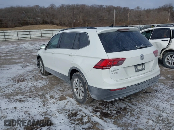 2019 Volkswagen Tiguan SE with VIN 3VV3B7AX7KM040136, listed as a IAAI auction lot 41397714 with 82,302 mi miles and . Bid and sale history available at DreamBid. Image 3.