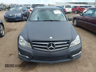 2014 Mercedes-Benz C 250 Sport with VIN WDDGF4HB8EG238824, listed as a IAAI auction lot 42001403 with 163,458 mi miles and . Bid and sale history available at carsss.com. Image 6.