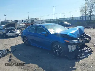 2019 Toyota Camry LE z VIN 4T1B11HK3KU166599, wystawiony jako IAAI lot #42069397 z przebiegiem 85 576 mil mil oraz . Historia ofert i sprzedaży dostępna na DreamBid. Obrazek 1.