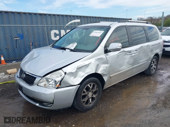 2014 Kia Sedona LX with VIN KNDMG4C70E6592842, listed as a IAAI auction lot 41861685 with 242,222 mi miles. Bid and sale history available at carsss.com. Image 2.