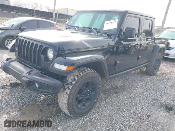 2023 Jeep Gladiator Sport S z VIN 1C6HJTAG7PL567903, wystawiony jako IAAI lot #41574387 z przebiegiem 49 378 mil mil oraz . Historia ofert i sprzedaży dostępna na DreamBid. Obrazek 2.