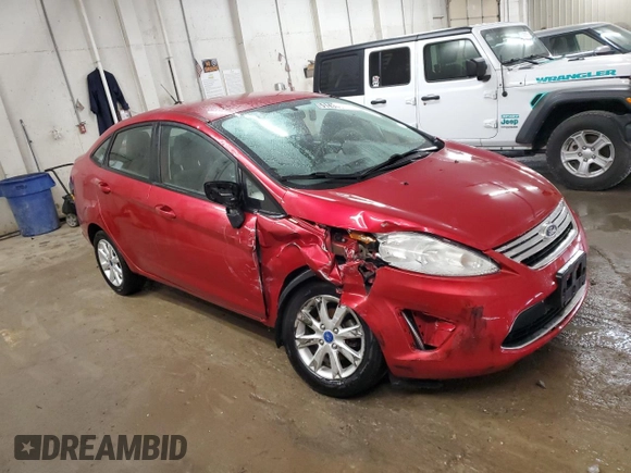 2012 Ford Fiesta SE with VIN 3FADP4BJ1CM147493, listed as a Copart auction lot 51436635 with 166,121 mi miles and Salvage Title. Bid and sale history available at DreamBid. Image 4.