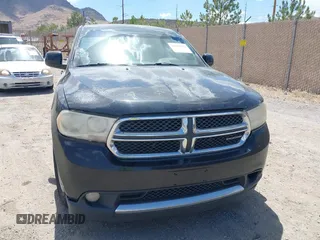 2012 Dodge Durango SXT with VIN 1C4RDJAG0CC206726, listed as a IAAI auction lot 42653653 with 243,337 mi miles and . Bid and sale history available at DreamBid. Image 12.