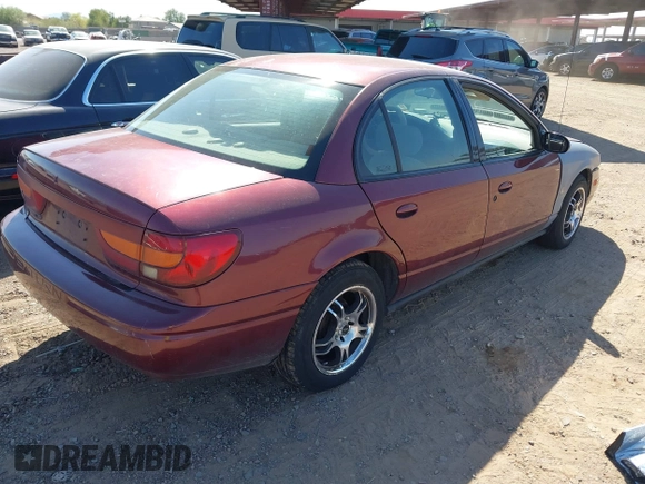 2002 Saturn SL with VIN 1G8ZK527X2Z276722, listed as a IAAI auction lot 42721685 with 126,462 mi miles and . Bid and sale history available at DreamBid. Image 4.