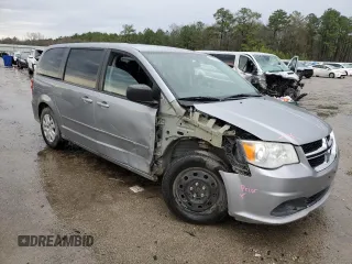 2014 Dodge Grand Caravan SE with VIN 2C4RDGBG3ER426969, listed as a Copart auction lot 43592225 with 135,423 mi miles and Salvage Title. Bid and sale history available at DreamBid. Image 4.