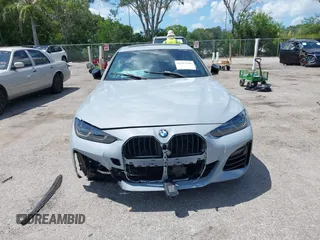 2023 BMW 4 Series M440i z VIN WBA63AW0XPFP50556, wystawiony jako IAAI lot #42517241 z przebiegiem 33 079 mil mil oraz . Historia ofert i sprzedaży dostępna na DreamBid. Obrazek 12.