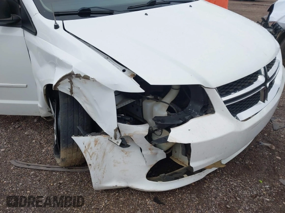 2017 Dodge Grand Caravan SE with VIN 2C4RDGBG9HR824594, listed as a IAAI auction lot 41250877 with 117,588 mi miles and . Bid and sale history available at DreamBid. Image 6.
