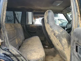 2000 Jeep Cherokee with VIN 1J4FF48S7YL209729, listed as a Copart auction lot 53647685 with 268,552 mi miles and Salvage title. Bid and sale history available at DreamBid. Image 10.