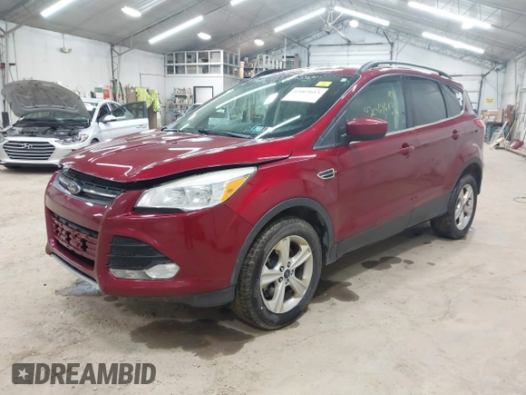 2013 Ford Escape SE z VIN 1FMCU9GX8DUC10980, wystawiony jako IAAI lot #42069613 z przebiegiem 153 890 mil mil oraz . Historia ofert i sprzedaży dostępna na DreamBid. Obrazek 2.