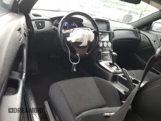 2014 Hyundai Genesis Coupe 2.0T z VIN KMHHT6KD1EU114887, wystawiony jako Copart lot #52775804 z przebiegiem 76 891 mil mil oraz Szkoda całkowita • Salvage title. Historia ofert i sprzedaży dostępna na DreamBid. Obrazek 8.