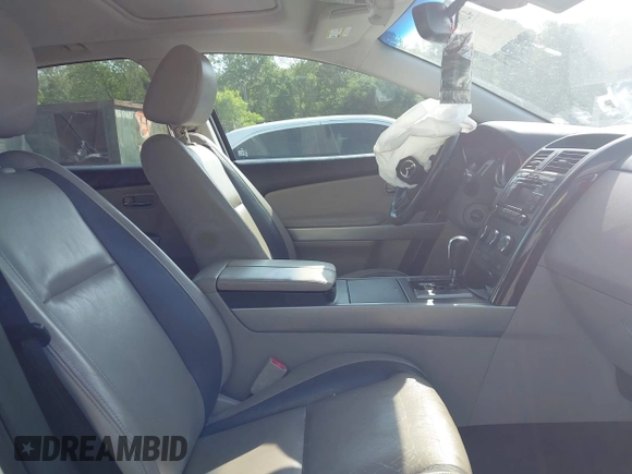 2011 Mazda CX-9 Grand Touring with VIN JM3TB2DA4B0305811, listed as a IAAI auction lot 42092829 with 232,298 mi miles and . Bid and sale history available at DreamBid. Image 5.