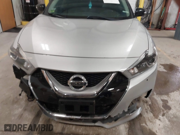 2016 Nissan Maxima SL with VIN 1N4AA6AP6GC384851, listed as a IAAI auction lot 41663659 with 127,247 mi miles and . Bid and sale history available at DreamBid. Image 12.