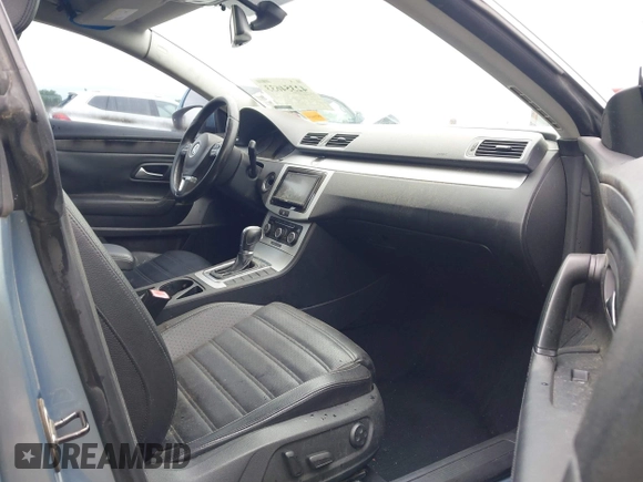 2012 Volkswagen CC Sport z VIN WVWMN7AN3CE520836, wystawiony jako IAAI lot #42354633 z przebiegiem 152 357 mil mil oraz . Historia ofert i sprzedaży dostępna na DreamBid. Obrazek 5.