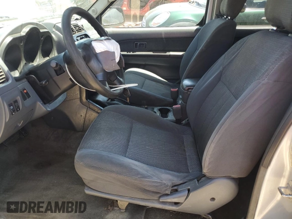 2002 Nissan Frontier XE z VIN 1N6ED29X72C374187, wystawiony jako Copart lot #55688645 z przebiegiem 354 656 mil mil oraz Szkoda całkowita • Salvage title. Historia ofert i sprzedaży dostępna na DreamBid. Obrazek 7.