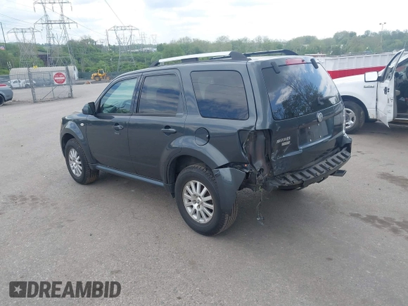 2009 Mercury Mariner Premier z VIN 4M2CU87719KJ13048, wystawiony jako IAAI lot #42181702 z przebiegiem 138 094 mil mil oraz . Historia ofert i sprzedaży dostępna na DreamBid. Obrazek 3.