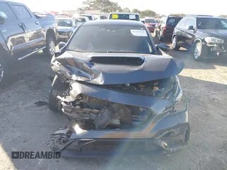 2022 Subaru WRX z VIN JF1VBAB65N8018712, wystawiony jako IAAI lot #41226618 z przebiegiem 24 309 mil mil oraz . Historia ofert i sprzedaży dostępna na DreamBid. Obrazek 6.