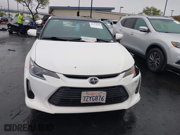 2014 Scion tC z VIN JTKJF5C77E3080128, wystawiony jako IAAI lot #42174898 z przebiegiem Nie podano mil oraz . Historia ofert i sprzedaży dostępna na DreamBid. Obrazek 12.