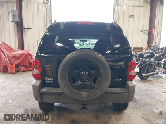 2003 Jeep Liberty Sport with VIN 1J4GL48K53W583860, listed as a IAAI auction lot 41632528 with 162,235 mi miles. Bid and sale history available at carsss.com. Image 16.