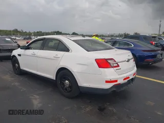 2015 Ford Police Interceptor with VIN 1FAHP2L83FG149326, listed as a IAAI auction lot 42477215 with 90,679 mi miles and . Bid and sale history available at DreamBid. Image 3.