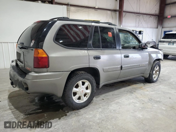 2005 GMC Envoy SLE с VIN 1GKDS13S752274178, выставлен на аукционе Copart как лот 55289005 с пробегом 199 378 миль миль и Списание • Salvage title. История ставок и продаж доступна на DreamBid. Изображение 3.