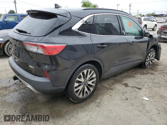 2020 Ford Escape Titanium with VIN 1FMCU9J97LUA59056, listed as a Copart auction lot 58445885 with Not provided miles and Salvage title. Bid and sale history available at DreamBid. Image 3.