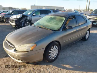 2003 Ford Taurus LX Standard with VIN 1FAFP52U33A235063, listed as a IAAI auction lot 41777293 with 164,125 mi miles and . Bid and sale history available at DreamBid. Image 17.