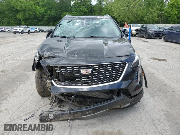 2020 Cadillac XT4 FWD Premium Luxury with VIN 1GYFZCR46LF113499, listed as a Copart auction lot 57534205 with 64,859 mi miles and Salvage title. Bid and sale history available at DreamBid. Image 5.